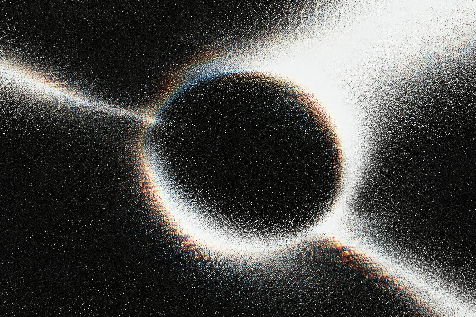 A dark central void surrounded by high-contrast grainy light and subtle chromatic aberration against a black field.