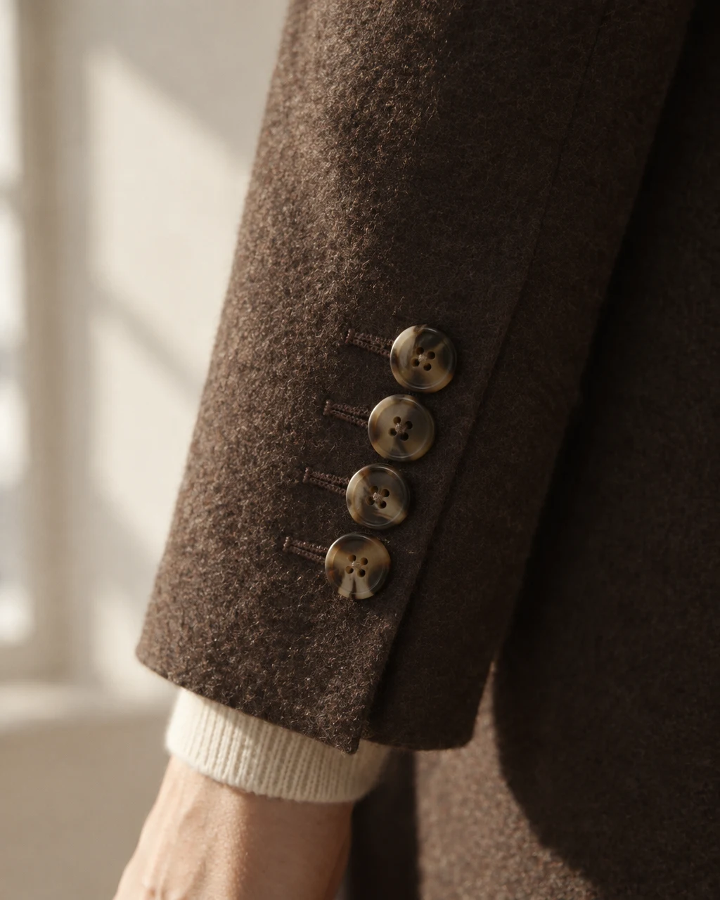 detail for made-to-measure architectural overcoats