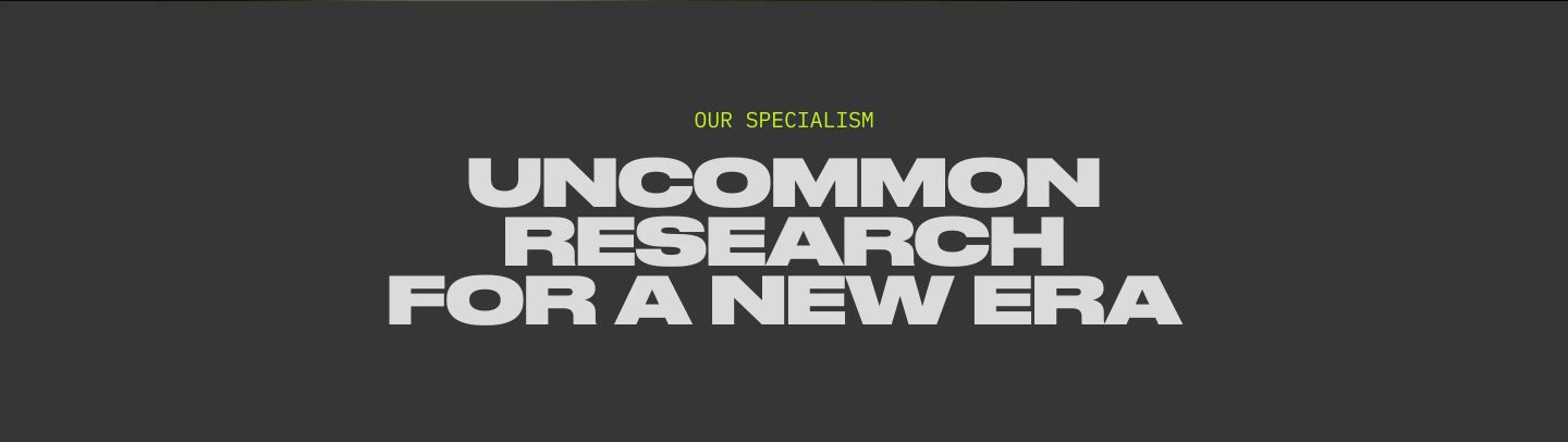Heavy extended typography on dark charcoal delivers a blunt, confident typographic section divider.