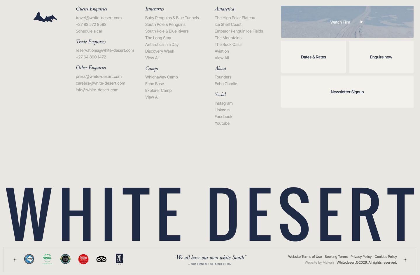 Expansive luxury footer anchoring the brand with massive condensed typography, delicate italic labels, and clean modular action cards.